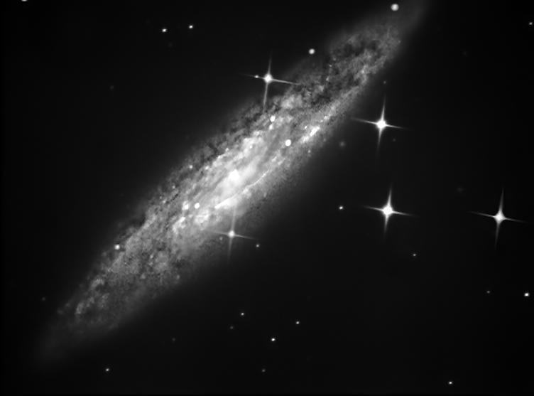 NGC_253.jpg.6cc197f5266fb8bbec65c5f606d1